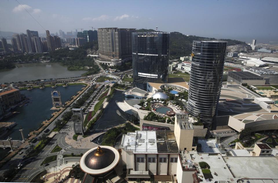 A top view of the Crown Macau, the complex of hotel and casino in Macau, Wednesday, April 11, 2012. Macau is in the midst of one of the greatest gambling booms the world has ever known. To rival it, Las Vegas would have to attract six times as many visitors essentially every man, woman and child in America. Wynn Las Vegas now makes nearly three-quarters of its profits in Macau. Sands, which owns the Venetian and Palazzo, earns two-thirds of its revenue there. (AP Photo/Kin Cheung)