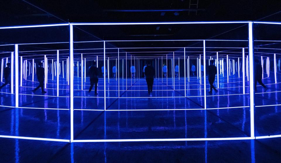 Otherworld founder Jordan Renda walks through a room of mirrors and lights at the 32,000-square-foot interactive art installation. [ADAM CAIRNS/DISPATCH]