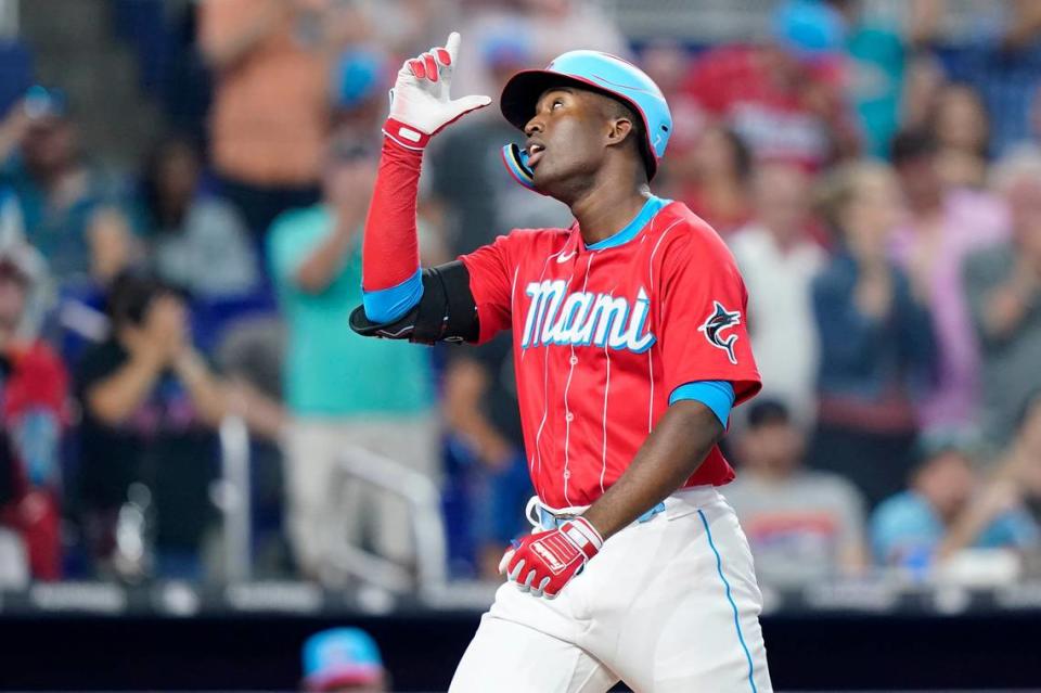 Miami Marlins’ Jesus Sanchez gestures skyward as he crosses home plate after hitting a two-run home run in the fourth inning of a baseball game against the New York Mets, Saturday, June 25, 2022, in Miami.