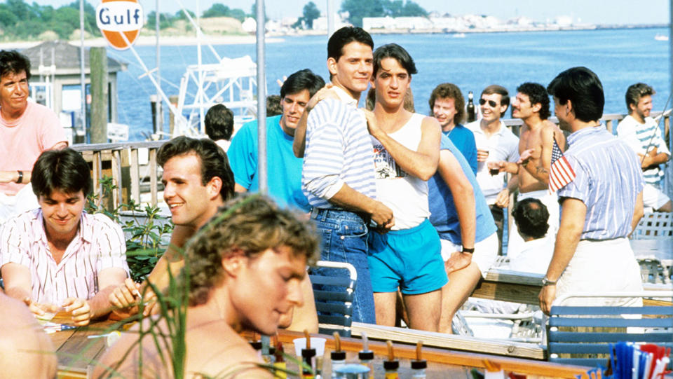 Campbell Scott striped shirt and Dermot Mulroney hand on shoulder in LONGTIME COMPANION, 1989.