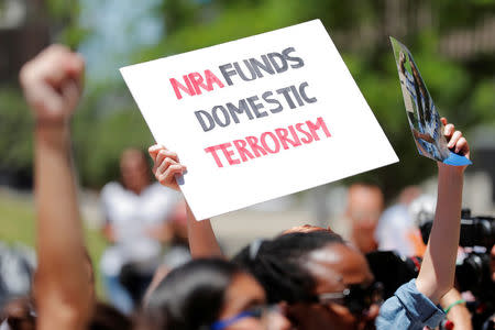 Gun control demonstrators protest outside of the annual National Rifle Association (NRA) convention in Dallas, Texas, U.S., May 5, 2018. REUTERS/Lucas Jackson