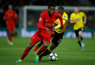 Britain Football Soccer - Watford v Liverpool - Premier League - Vicarage Road - 1/5/17 Watford's Christian Kabasele in action with Liverpool's Divock Origi Action Images via Reuters / Andrew Couldridge Livepic