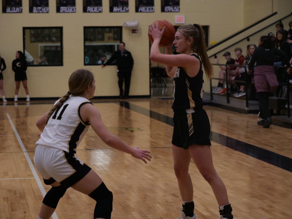 Canadian's Brooklyn Cochran (right) looks to pass the ball against Bushland's Jada Permenter (11) on Tuesday, February 7, 2023 at Bushland High School.