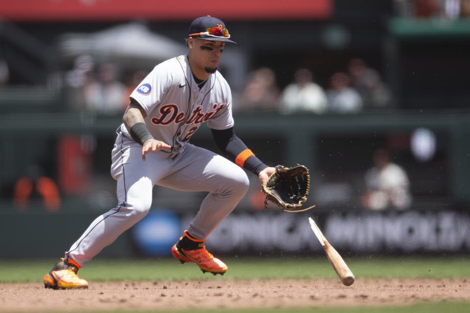 Detroit Tigers shortstop Javier Báez (28) tries to avoid the barrel of San Francisco Giants' Evan Longoria's broken bat while also fielding his ground ball during the third inning of a baseball game, Wednesday, June 29, 2022, in San Francisco. Báez was unable to make a play and Longoria was credited with a hit. (AP Photo/D. Ross Cameron)