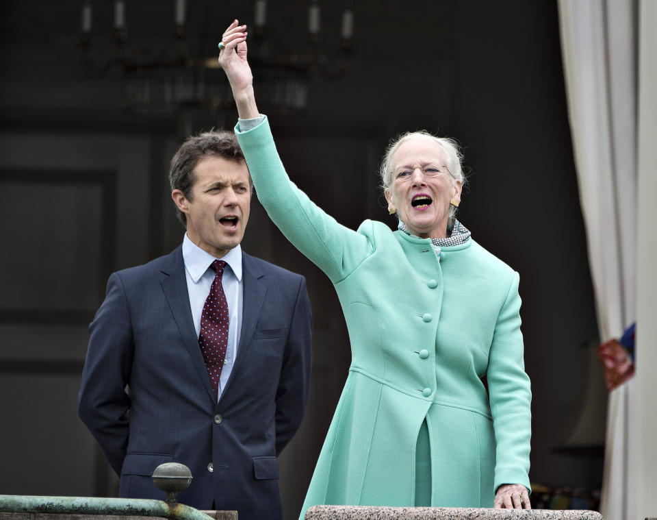 FILE - Queen Margrethe of Denmark with her son Crown Prince Frederik at Marselisborg Castle in Aarhus, Denmark, April 16, 2017, to celebrate her 77th birthday. Denmark’s popular monarch Queen Margrethe is marking 50 years on the throne with low-key events on Friday Jan. 14, 2022. The public celebrations of Friday's anniversary have been delayed until September due to the pandemic. (Henning Bagger/Ritzau Scanpix via AP, File)