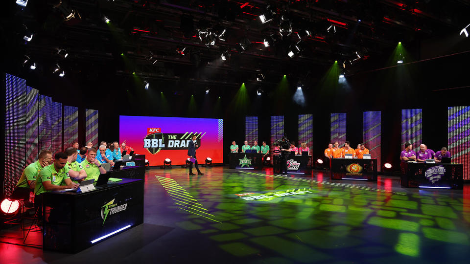 Representatives from the eight Big Bash League teams are pictured at the draft.