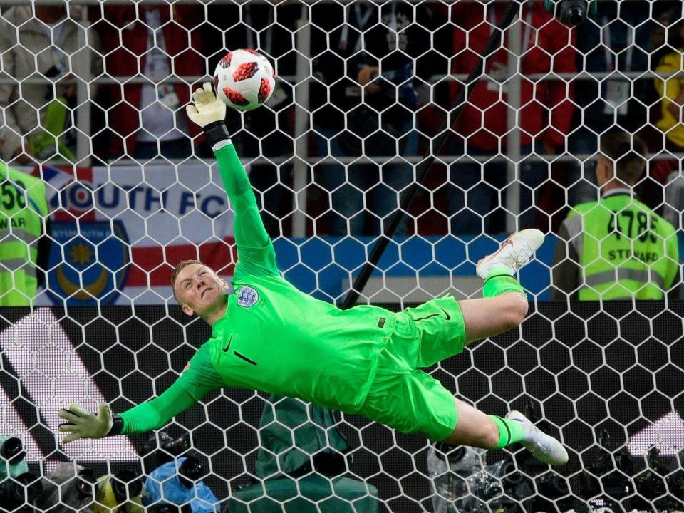 England's Jordan Pickford stops Colombia's Carlos Bacca's shot during the penalty shootout (Getty)