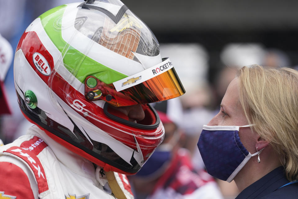 Simona De Silvestro, left, of Switzerland, talks with Beth Paretta after qualifying for the Indianapolis 500 auto race at Indianapolis Motor Speedway, Sunday, May 23, 2021, in Indianapolis. (AP Photo/Darron Cummings)