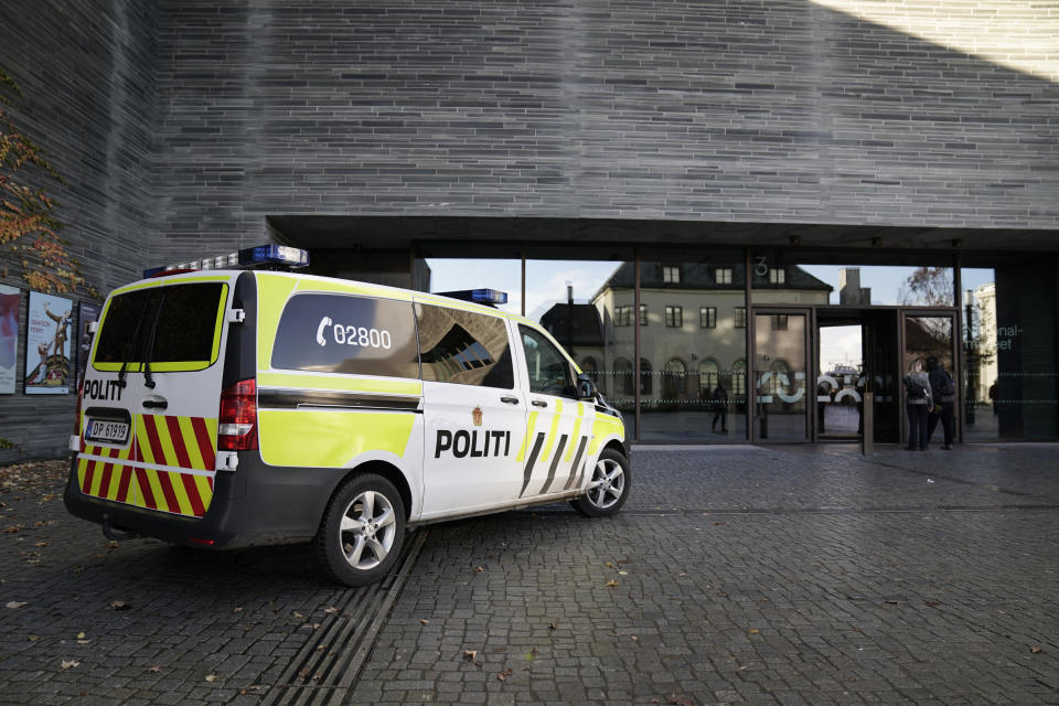 A police vehicle is parked outside the National Museum where activists from the organization ''Stopp Oljeletinga'' have tried to glue themselves to the frame of Munch's painting "The Scream", in Oslo, Norway, Friday Nov. 11, 2022. (Stian Lysberg Solum/NTB Scanpix via AP)