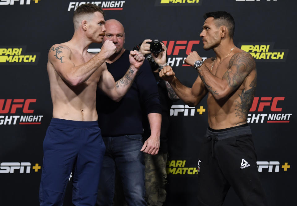 LAS VEGAS, NEVADA - NOVEMBER 13: In this UFC handout,  (L-R) Opponents Paul Felder and Rafael Dos Anjos of Brazil face off during the UFC weigh-in at UFC APEX on November 13, 2020 in Las Vegas, Nevada. (Photo by Jeff Bottari/Zuffa LLC via Getty Images)