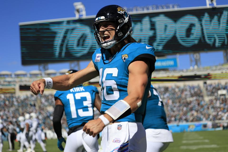 Jacksonville Jaguars quarterback Trevor Lawrence (16) celebrates the third touchdown for the Jaguars during the second quarter of an NFL football matchup Sunday, Oct. 15, 2023 at EverBank Stadium in Jacksonville, Fla.
