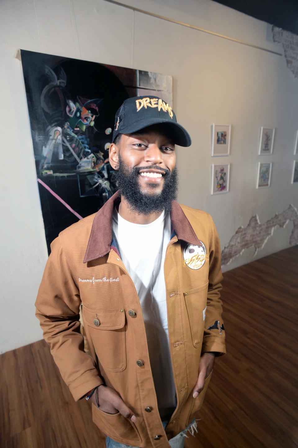 Freddie Mendes of Brockton, founder of Dreams from the East, a streetwear company, stops by his friend Ryan Jones’ tattoo studio, Real Art Studios, at 31MainSt. In Taunton April  29, 2022.