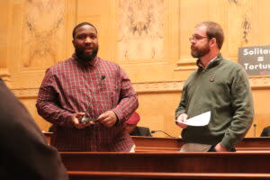 Rep. Darrin Madison (D-Milwaukee) stands next to Rep. Ryan Clancy (D-Milwaukee) during a day of action to end solitary confinement. (Photo | Isiah Holmes)