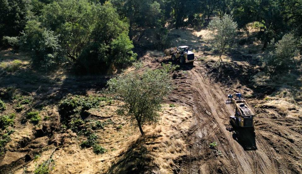 Crew begins work on a fishery restoration project along the Stanislaus River at Kerr Park in Oakdale, Calif., Tuesday, Oct. 3, 2023.