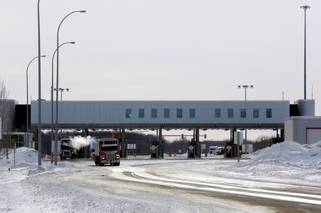 The Canadian side of the Canada-U.S border crossing, where refugees make their way into the province, is seen in Emerson, Manitoba, Canada, February 1, 2017. REUTERS/Lyle Stafford