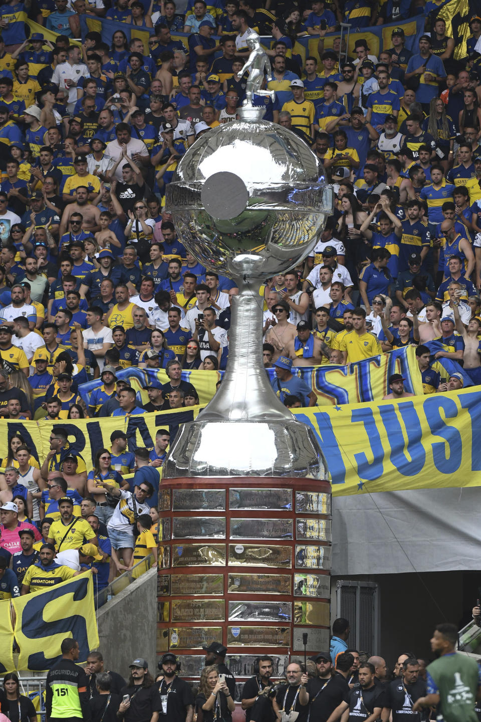 An inflatable Copa Libertadores trophy towers over spectators prior to the tournament's final soccer match between Argentina's Boca Juniors and Brazil's Fluminense, at the Maracana stadium in Rio de Janerio, Brazil, Saturday, Nov. 4, 2023. (AP Photo/Alexandre Brum)