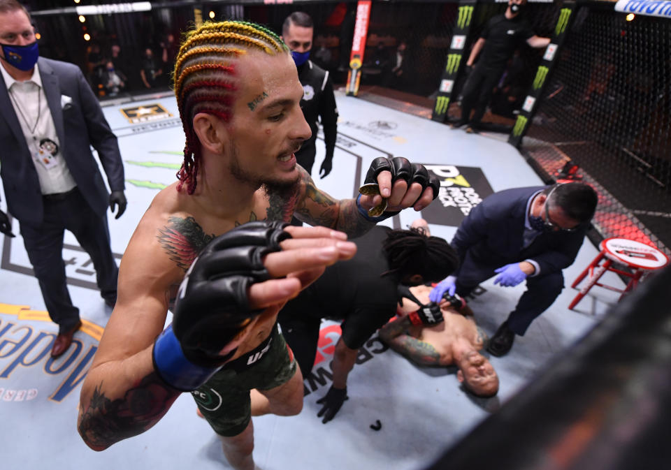 Sean O'Malley reacts after his knockout victory over Eddie Wineland in their bantamweight bout during the UFC 250 event at UFC APEX on June 06, 2020 in Las Vegas, Nevada. 