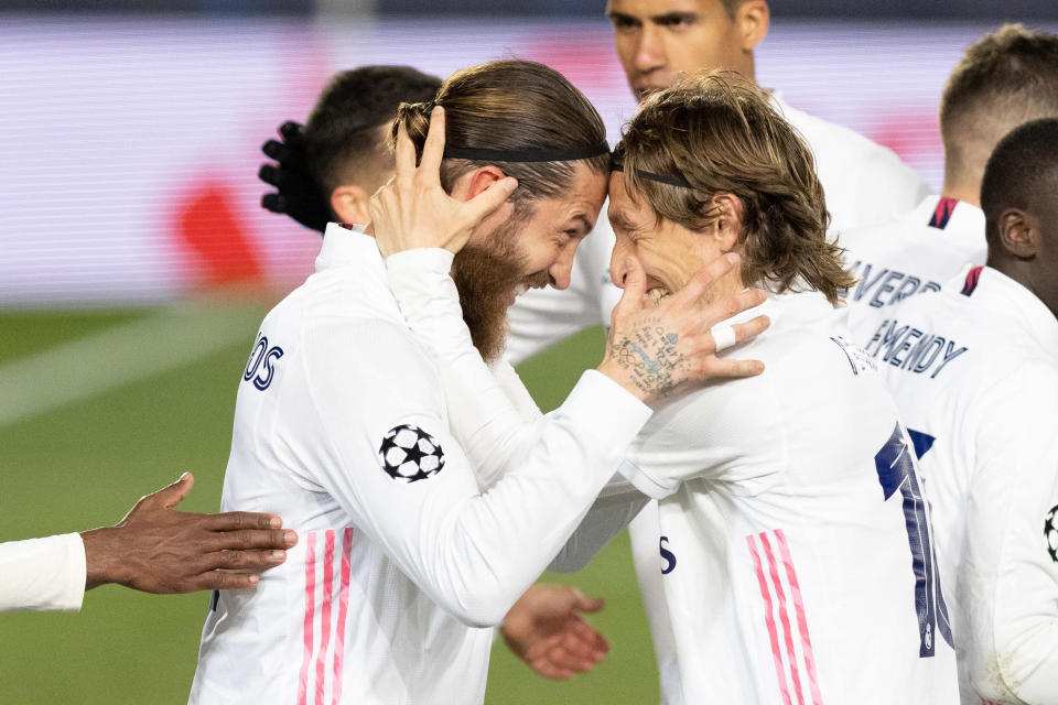 Sergio Ramos and Luka Modric celebrates after scoring his team's second goal during the UEFA Champions League Round of 16 match between Real Madrid and Atalanta at Estadio Santiago Bernabeu.