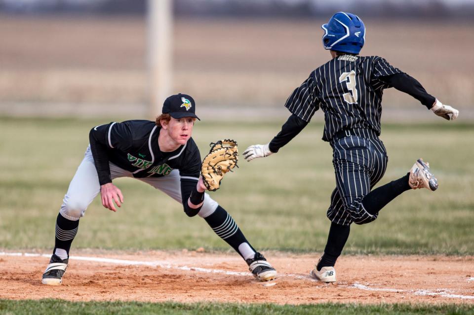North Boone's Jack Lipinsky catches the ball at first base before Rockford Christian's Devan Bruggeman made it to the base on Tuesday, April 19, 2022, at North Boone Middle School in Popular Grove.