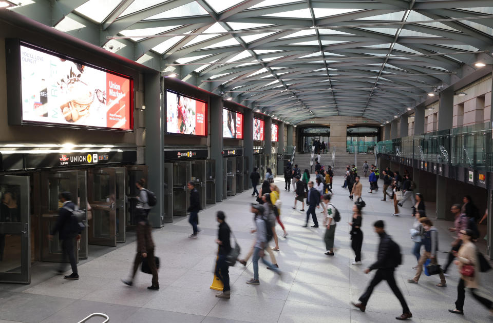 TORONTO, ON- MAY 12  -  Commuters make their way into and out for the city in the moat between Union Station and the  subway station and the PATH at Union Station in Toronto. May 12, 2023.        (Steve Russell/Toronto Star via Getty Images)