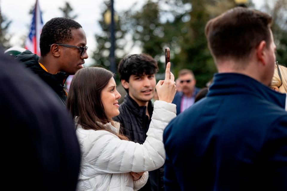 Rena Haley Jackson, her husband, Joshua Jackson, and and Nalin Haley watch Nikki Haley talk to attendees during a campaign stop in Camden on Monday, Feb. 19, 2024