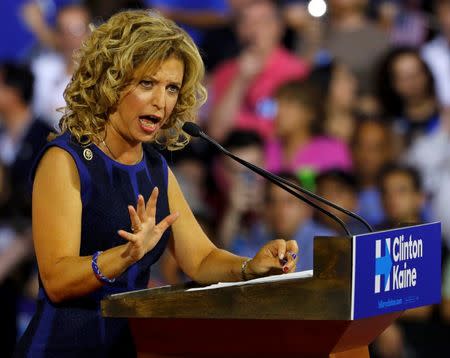 Democratic National Committee (DNC) Chairwoman Debbie Wasserman Schultz speaks at a rally, before the arrival of Democratic U.S. presidential candidate Hillary Clinton and her vice presidential running mate U.S. Senator Tim Kaine, in Miami, Florida, U.S. July 23, 2016. Picture taken July 23, 2016. REUTERS/Scott Audette