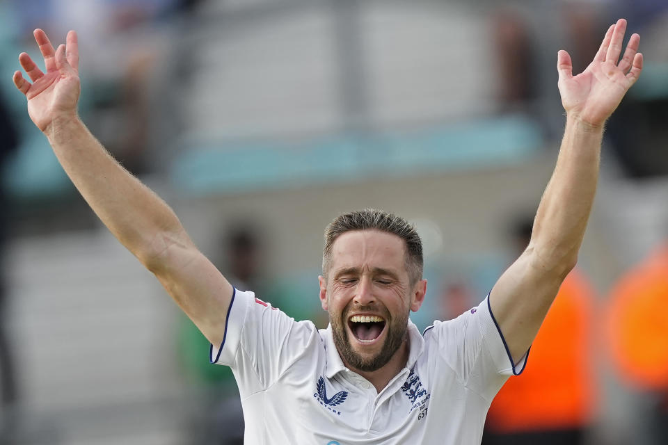 England's Chris Woakes celebrates the dismissal of Australia's Todd Murphy during the second day of the fifth Ashes Test match between England and Australia at The Oval cricket ground in London, Friday, July 28, 2023. (AP Photo/Kirsty Wigglesworth)
