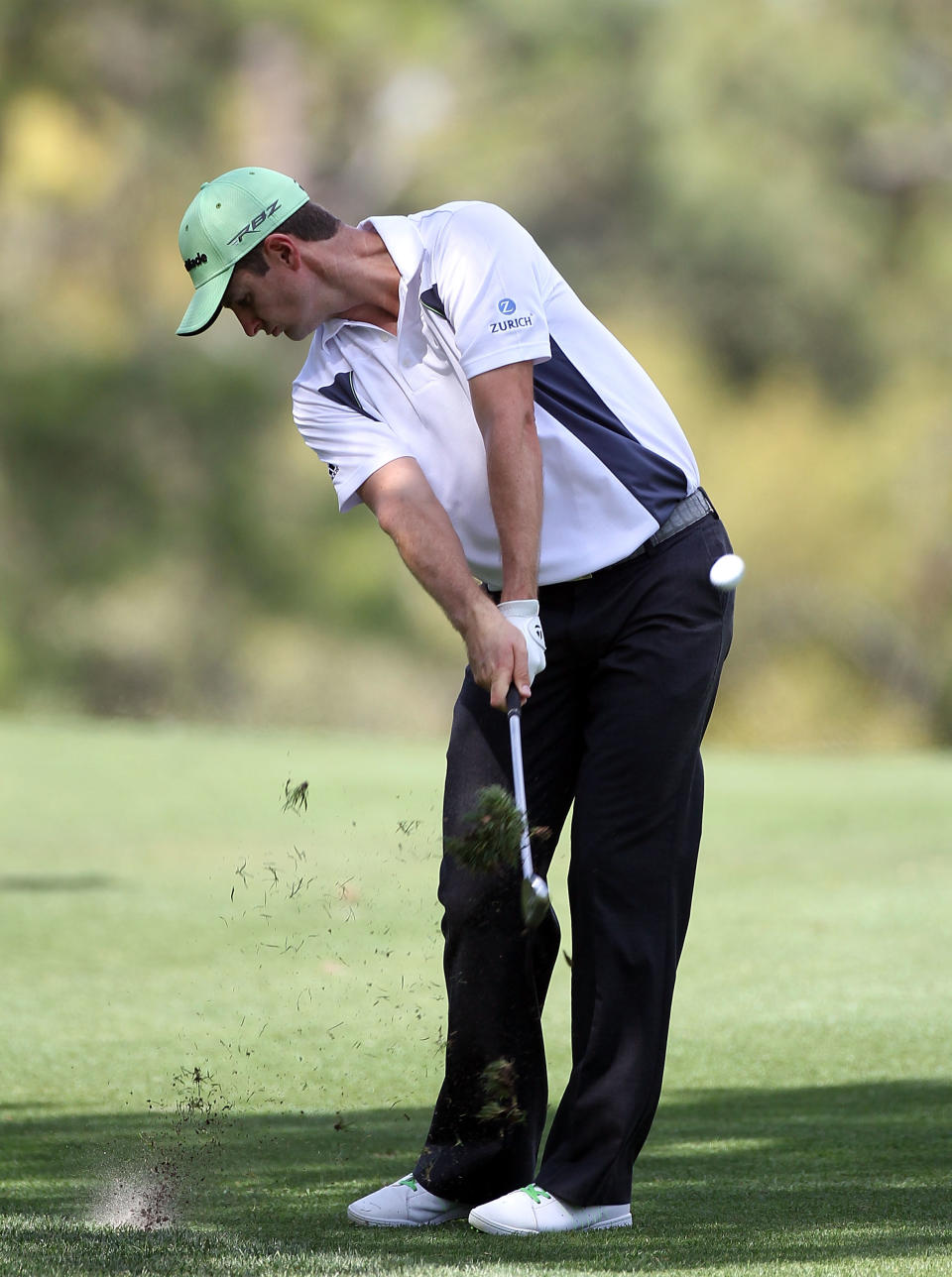 PALM HARBOR, FL - MARCH 15: Justin Rose of England plays a shot on the 7th hole during the first round of the Transitions Championship at Innisbrook Resort and Golf Club on March 15, 2012 in Palm Harbor, Florida. (Photo by Sam Greenwood/Getty Images)