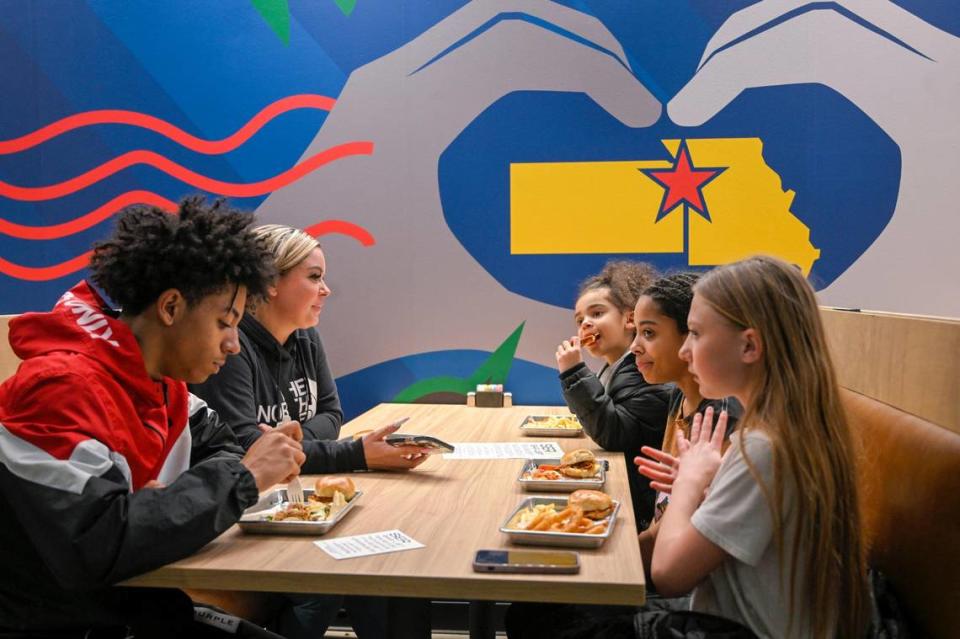 The Clay family, including, clockwise from left, Kavian Clay, 14, Courtney Clay, Kinley Clay, 6, Kalieya Clay, 11, and cousin Ava Burdick, 11, dined at Serv during a soft opening Thursday.