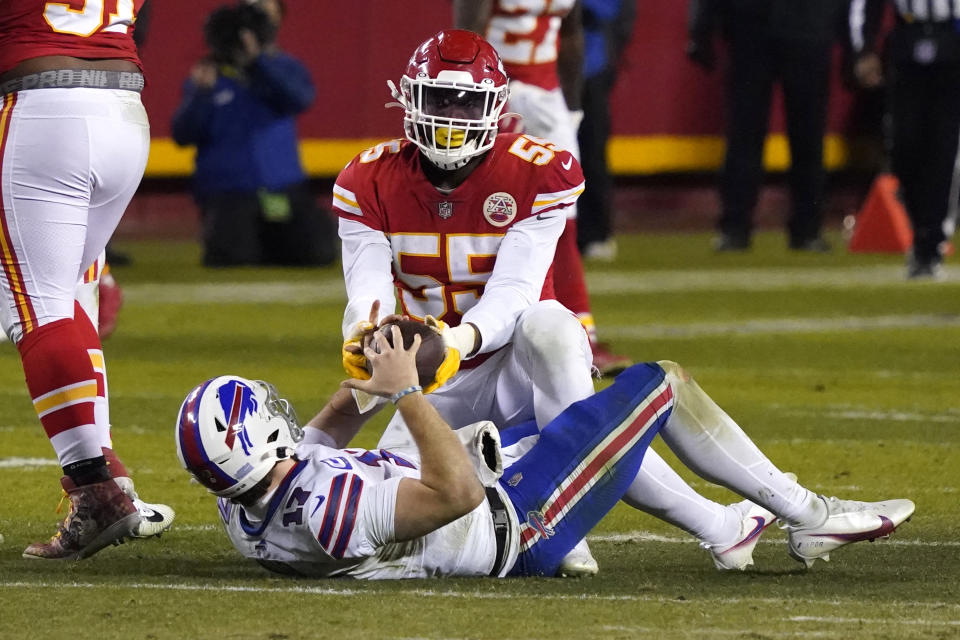 Buffalo Bills quarterback Josh Allen (17) is sacked by Kansas City Chiefs defensive end Frank Clark (55) during the second half of the AFC championship NFL football game, Sunday, Jan. 24, 2021, in Kansas City, Mo. (AP Photo/Jeff Roberson)