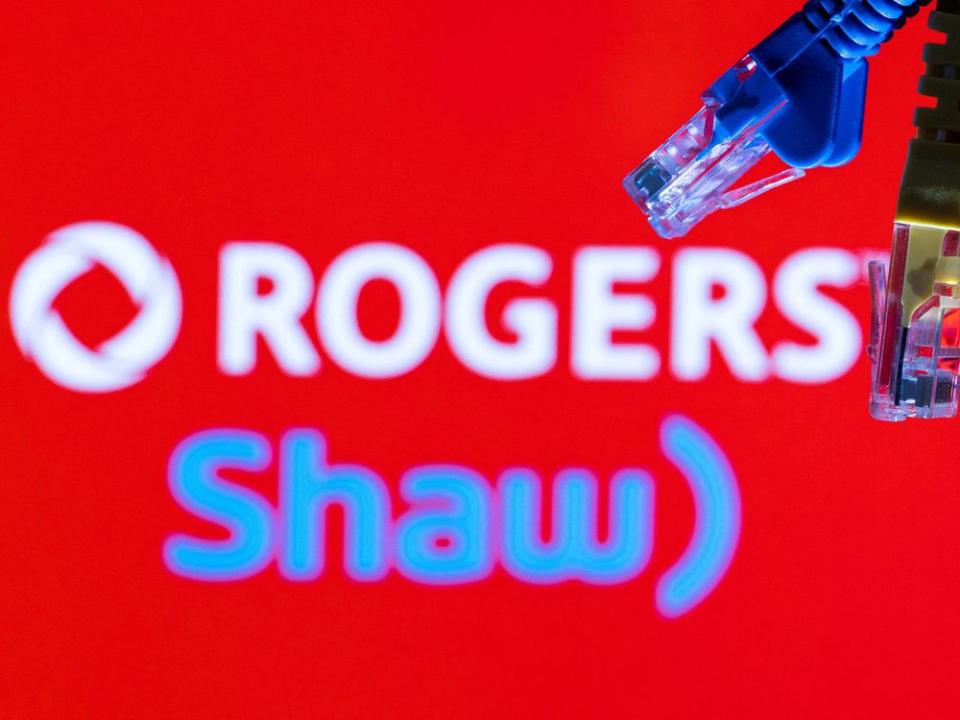 FILE PHOTO: Illustration shows Rogers and Shaw Communications logos