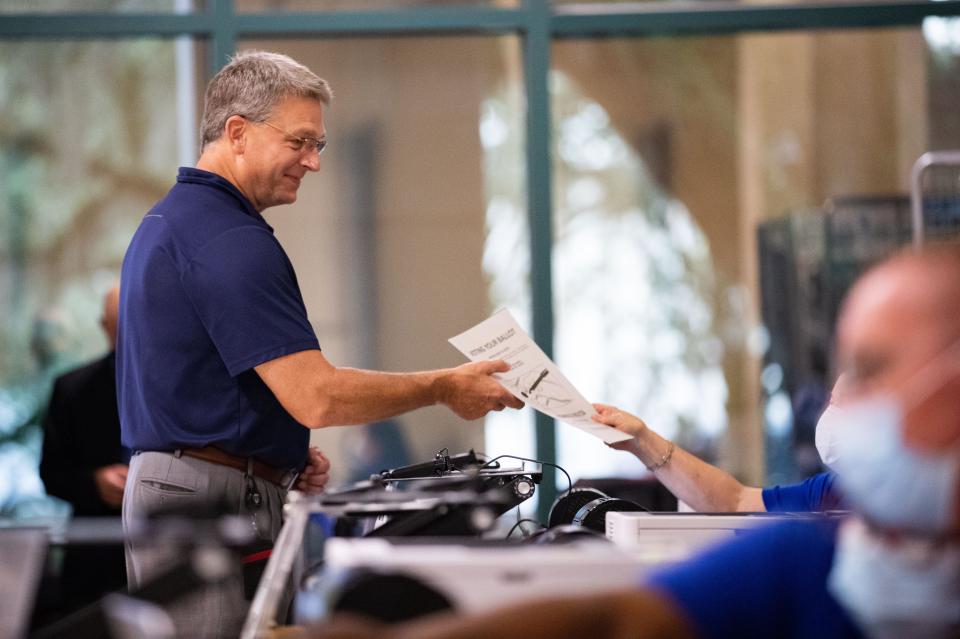 Supervisor of Elections Mark Earley casts his ballot at the Leon County Courthouse on Saturday, Aug. 13, 2022.