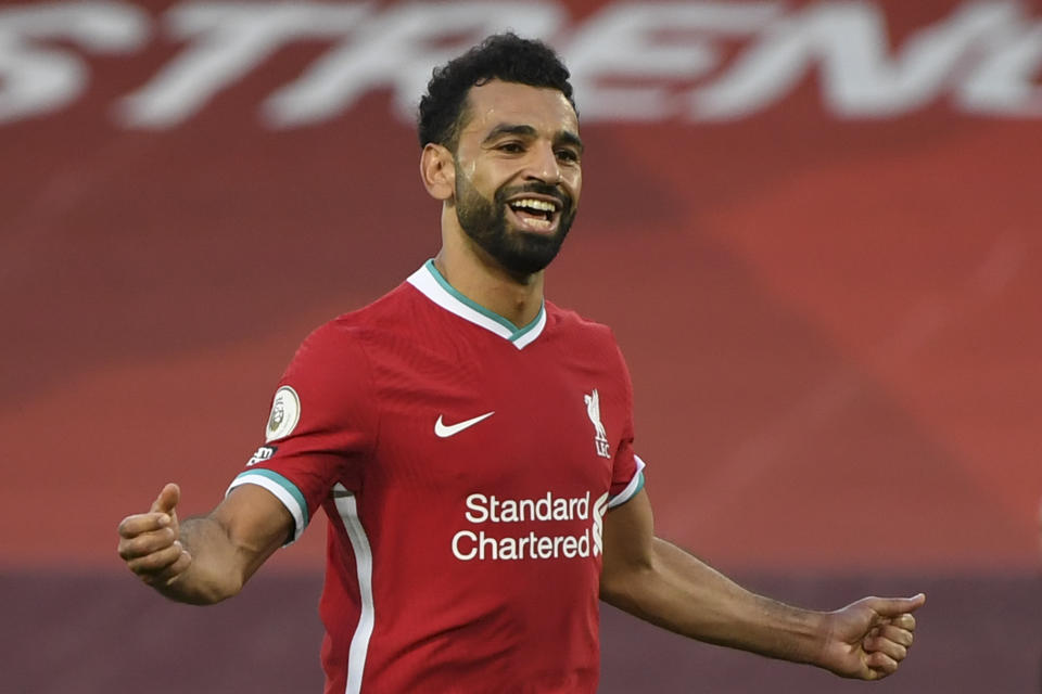 El astro de Liverpool Mohamed Salah celebra tras anotar el cuarto gol de su equipo en un partido de la Liga Premier inglesa contra Leeds en el estadio Amfield, en Liverpool, el sábado, 12 de septiembre del 2020. (Shaun Botterill, Pool vía AP)