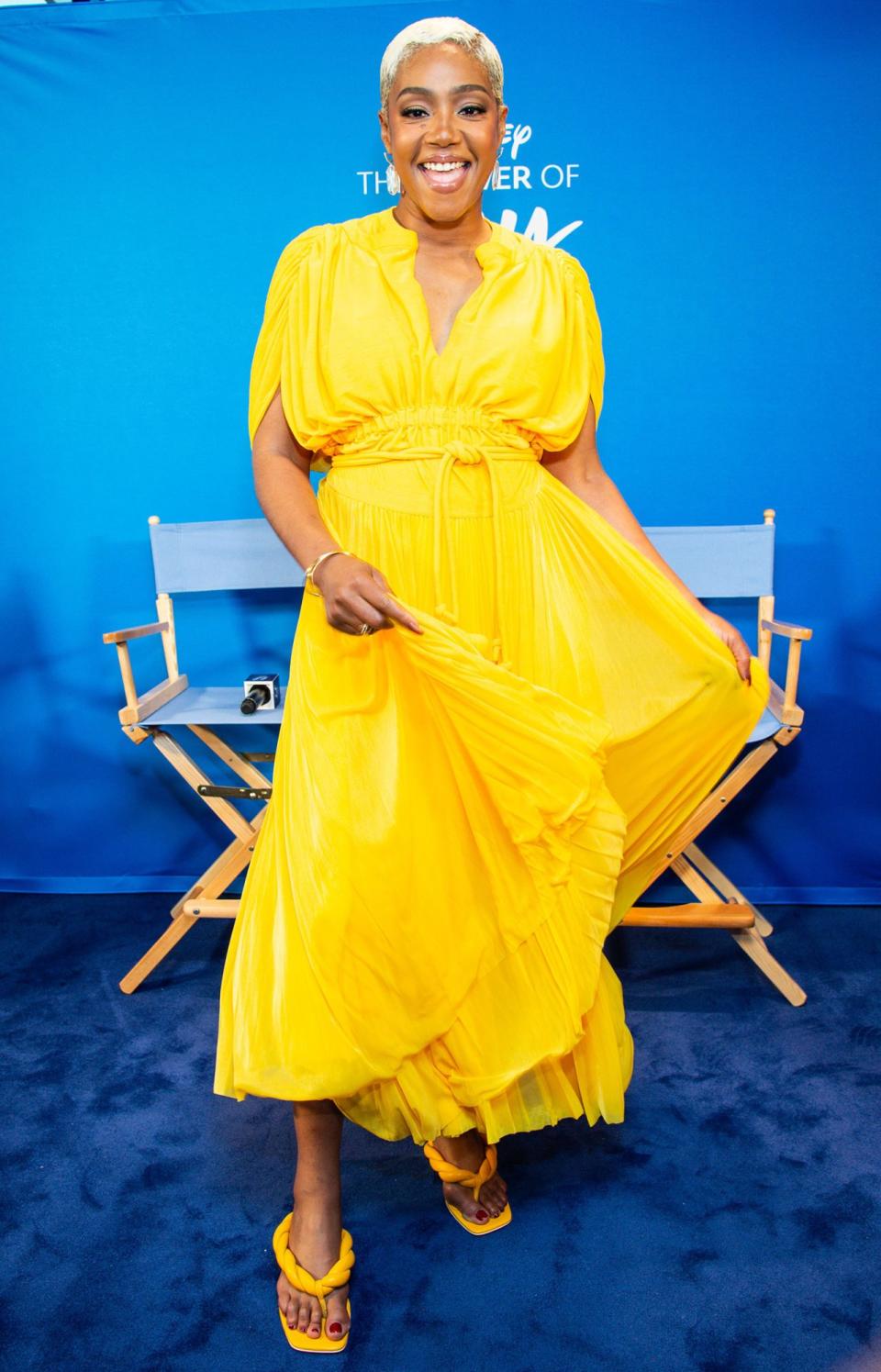 <p>Tiffany Haddish is all smiles in head-to-toe yellow while attending the Disney Influencer Panel at the 2022 Essence Festival of Culture in New Orleans on July 3.</p>