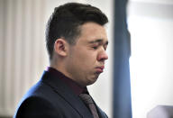 FILE - Kyle Rittenhouse reacts as he is found not guilty on all counts at the Kenosha County Courthouse in Kenosha, Wis., Friday, Nov. 19, 2021. The November verdict in a Wisconsin courtroom ended the 18-year-old’s murder trial, the jury believing he acted in self-defense in shooting three people during protests over racial injustice. (Sean Krajacic/The Kenosha News via AP, Pool)