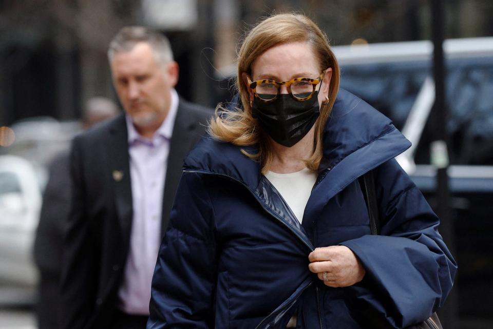Marci Palatella, the chief executive of a liquor distribution company, arrives at the federal courthouse for a hearing for her role in the vast college admissions fraud scheme called "Varsity Blues," in Boston, Massachusetts, on December 16, 2021.