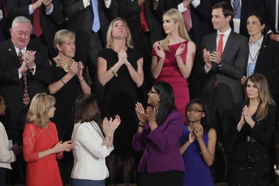 Carryn Owens, widow of widow of Chief Special Warfare Operator William “Ryan” Owens, is applauded on Capitol Hill in Washington, Tuesday, Feb. 28, 2017, as she was acknowledged by President Donald Trump during his address to a joint session of Congress. (AP Photo/J. Scott Applewhite)