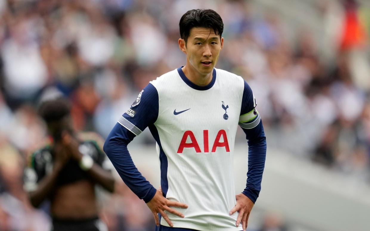 Son Heung-Min with his hands on his hips