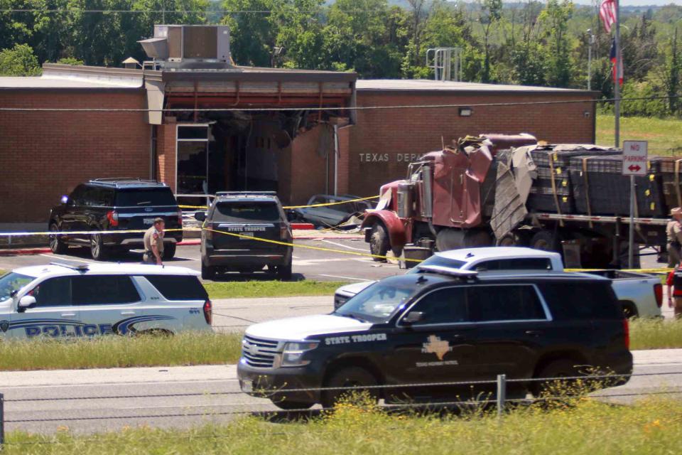 <p>AP Photo/Lekan Oyekanmi</p> Scene of the crash