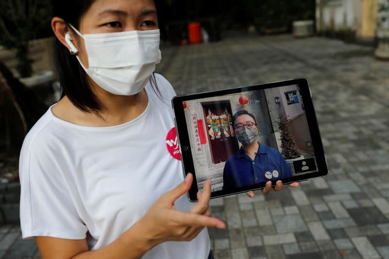 Charles Lai, guest speaker of Walk in Hong Kong, is seen on a screen during a virtual tour, following the coronavirus disease (COVID-19) outbreak in Hong Kong
