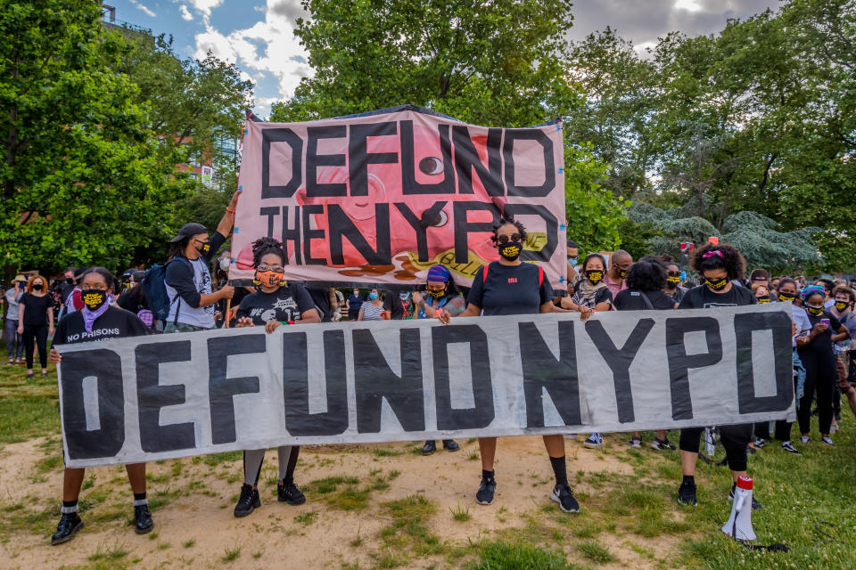 Participants holding a giant Defund NYPD banner. Thousands of protesters gathered at Mc Carren Park in Brooklyn for a massive march around Williamsburg, making a loud call for the defunding of the police force.(Erik McGregor/LightRocket via Getty Images)