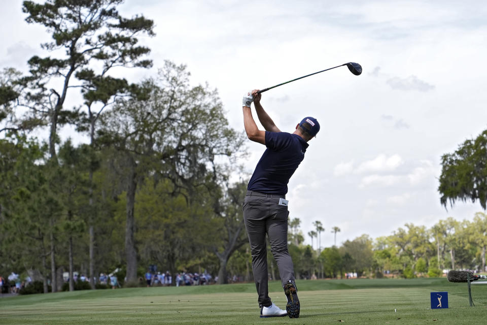 Wyndham Clark tees off on the ninth hole during the second round of The Players Championship golf tournament Friday, March 15, 2024, in Ponte Vedra Beach, Fla. (AP Photo/Lynne Sladky)