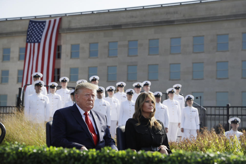 President Donald Trump and first lady Melania Trump participate in a program honoring the victims of the Sept. 11 terrorist attacks, Wednesday, Sept. 11, 2019, at the Pentagon. (AP Photo/Evan Vucci)