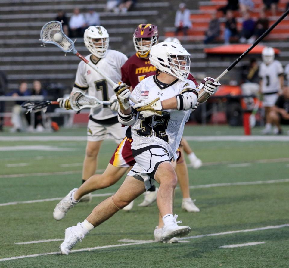 Corning's Ethan Hart brings the ball up the field during a 12-3 win over Ithaca in the Section 4 Class A boys lacrosse championship game May 26, 2022 at Union-Endicott.