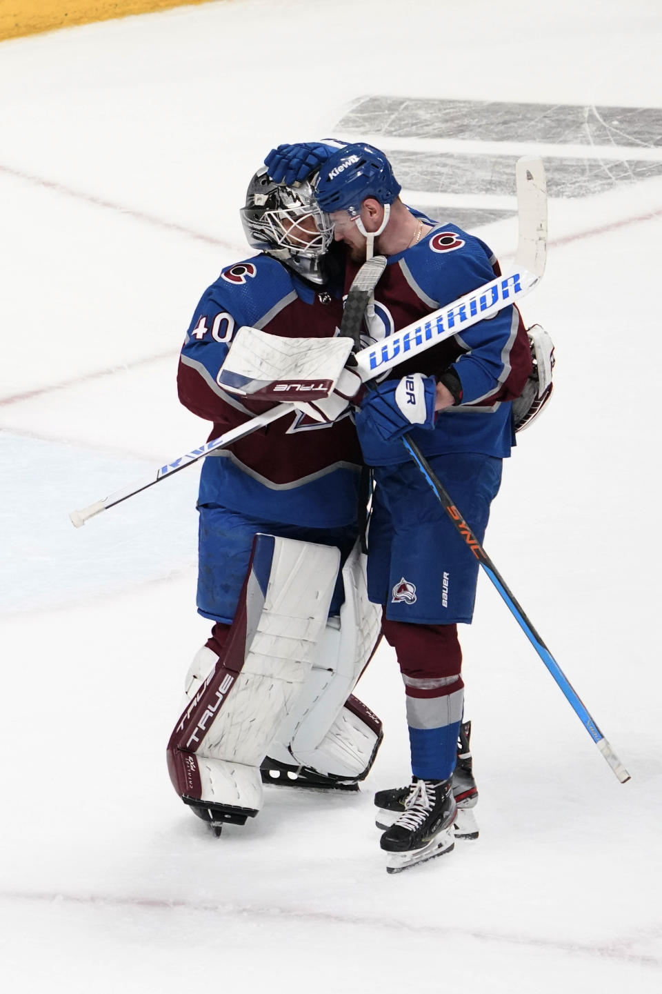 Colorado Avalanche right wing Valeri Nichushkin and goaltender Alexandar George (40) celebrate the team's win against the Seattle Kraken in Game 2 of a first-round NHL hockey playoff series Thursday, April 20, 2023, in Denver. (AP Photo/Jack Dempsey)