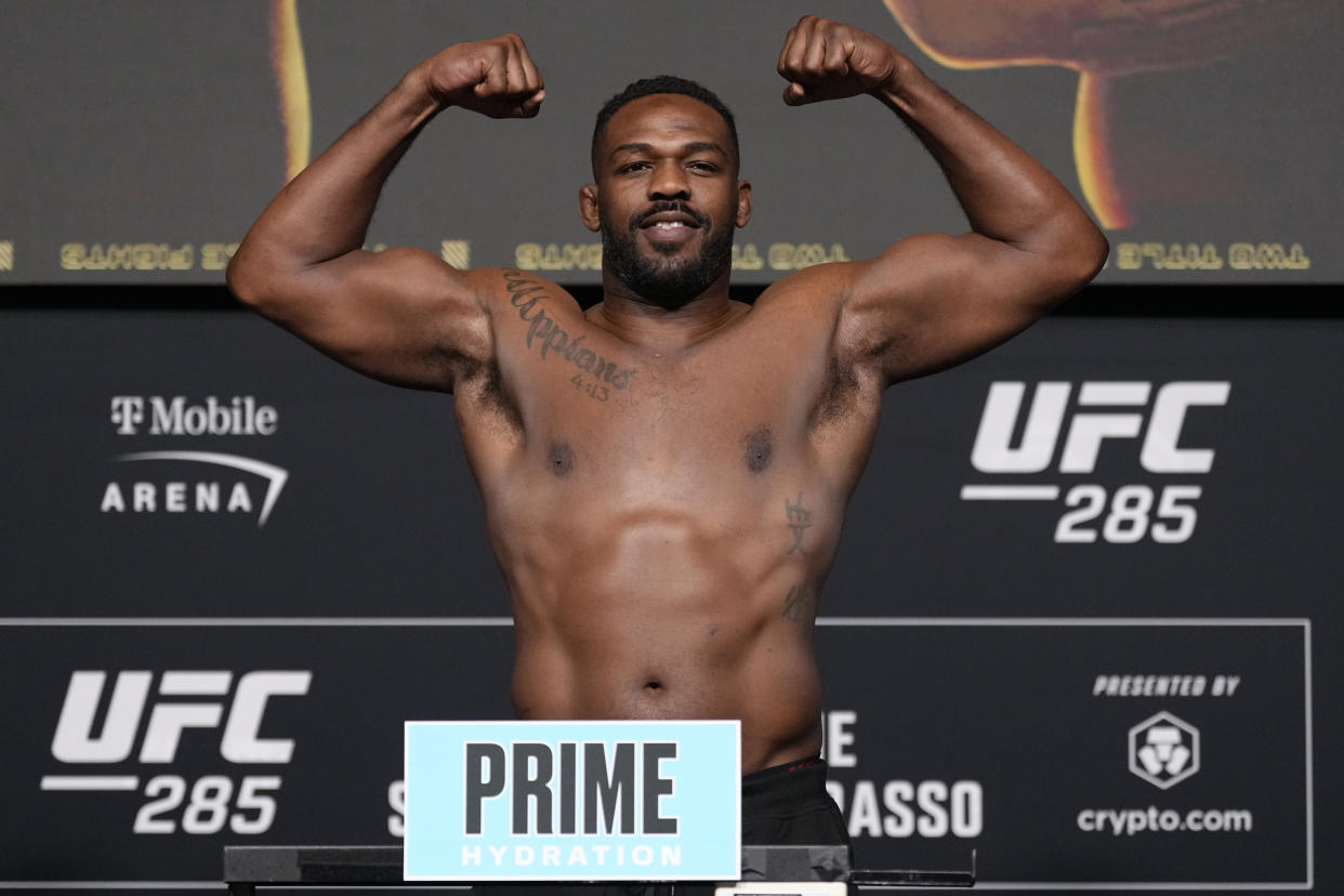 LAS VEGAS, NEVADA - MARCH 03: Jon Jones poses on the scale during the UFC 285 official weigh-in at UFC APEX on March 03, 2023 in Las Vegas, Nevada. (Photo by Jeff Bottari/Zuffa LLC via Getty Images)