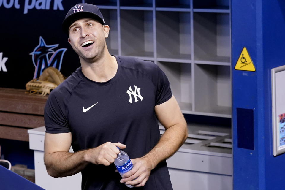 New York Yankees right fielder Joey Gallo looks out from the dugout before the team's baseball game against the Miami Marlins, Friday, July 30, 2021, in Miami. Gallo was acquired from the Texas Rangers in a trade. (AP Photo/Lynne Sladky)