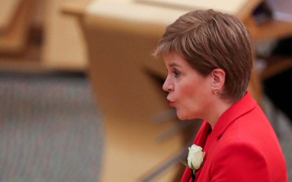 Scotland's First Minister Nicola Sturgeon makes an affirmation at the Scottish Parliament in Edinburgh - AFP