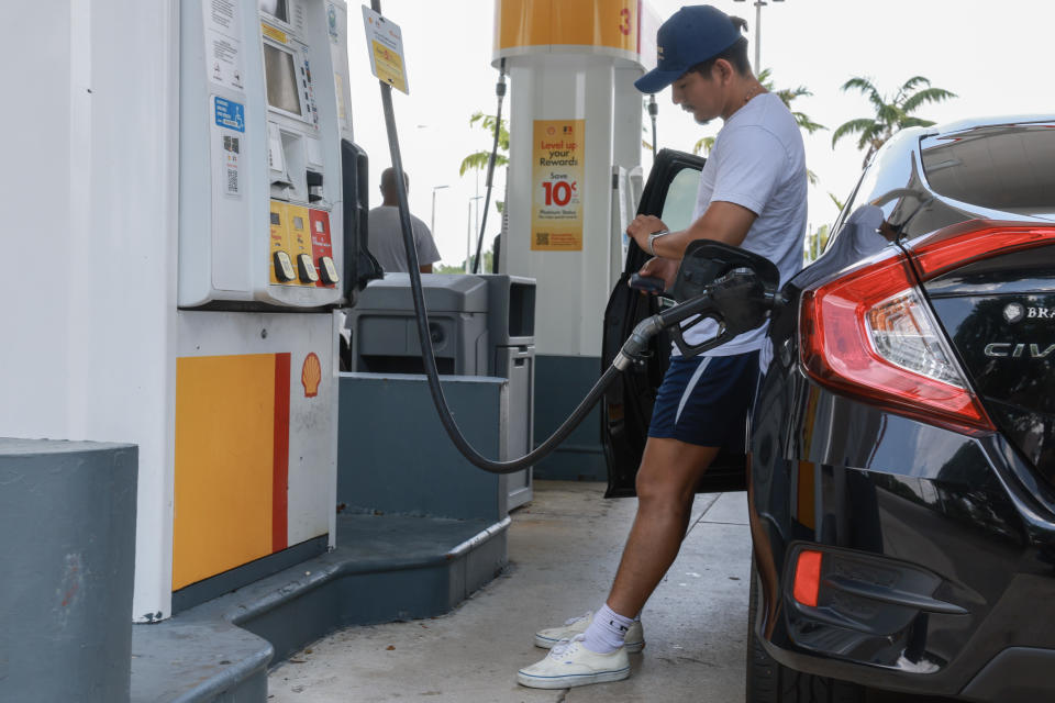 MIAMI, FLORIDA - MAY 15: A customer gets gas at a Shell station on May 15, 2024 in Miami, Florida. Florida drivers saw prices fall 16 cents a gallon in the past week just before drivers hit the roads for Memorial Day. The national average Monday was $3.62 a gallon, putting pressure on consumer prices as overall inflation eased. (Photo by Joe Raedle/Getty Images)