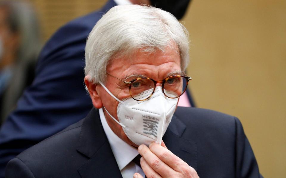Hesse's State Premier Volker Bouffier wears a face mask as he attends the 1000th session of the upper house of Parliament, the Bundesrat, on February 12, 2021 in Berlin. (Photo by FABRIZIO BENSCH / POOL / AFP) (Photo by FABRIZIO BENSCH/POOL/AFP via Getty Images) -  FABRIZIO BENSCH/AFP